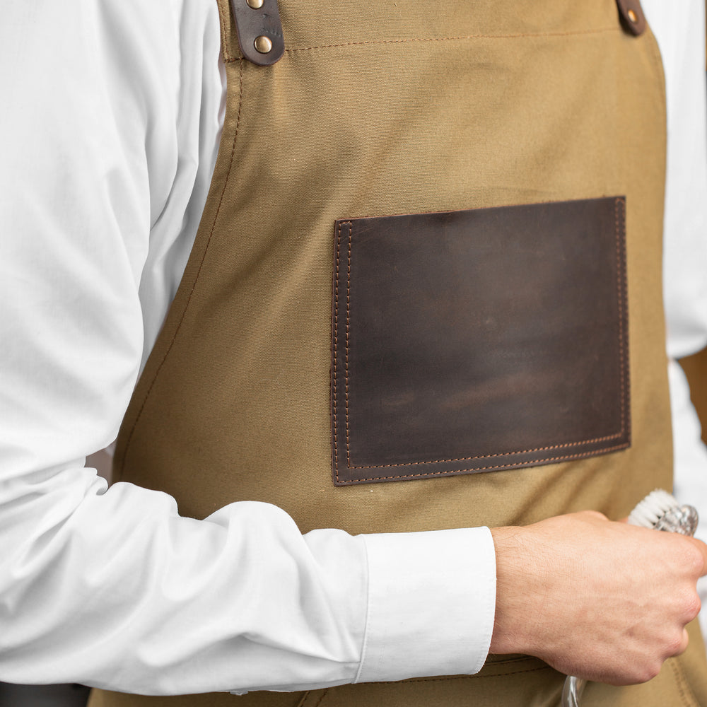 
                      
                        Canvas and Leather Apron - Camel
                      
                    