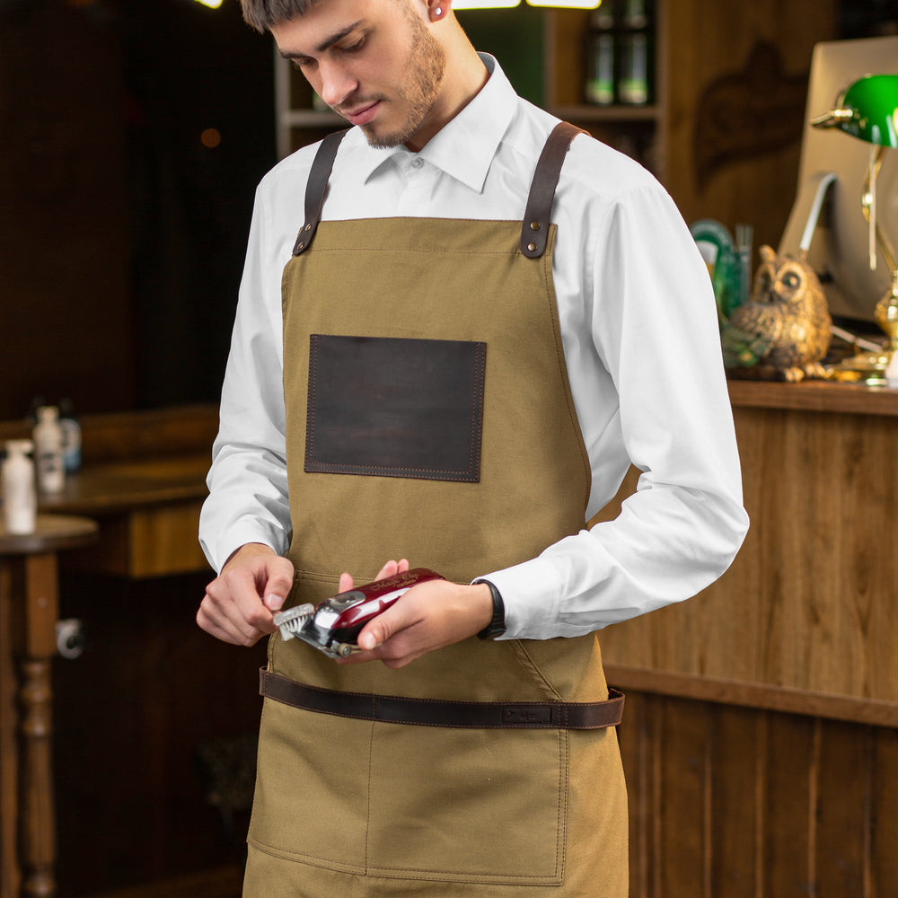 
                      
                        Canvas and Leather Apron - Camel
                      
                    