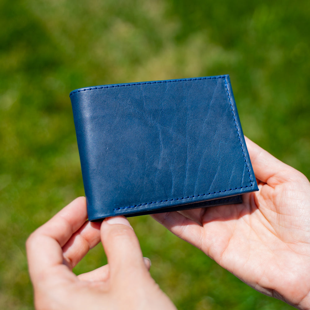 
                      
                        Classic Leather Bifold Wallet - Navy
                      
                    