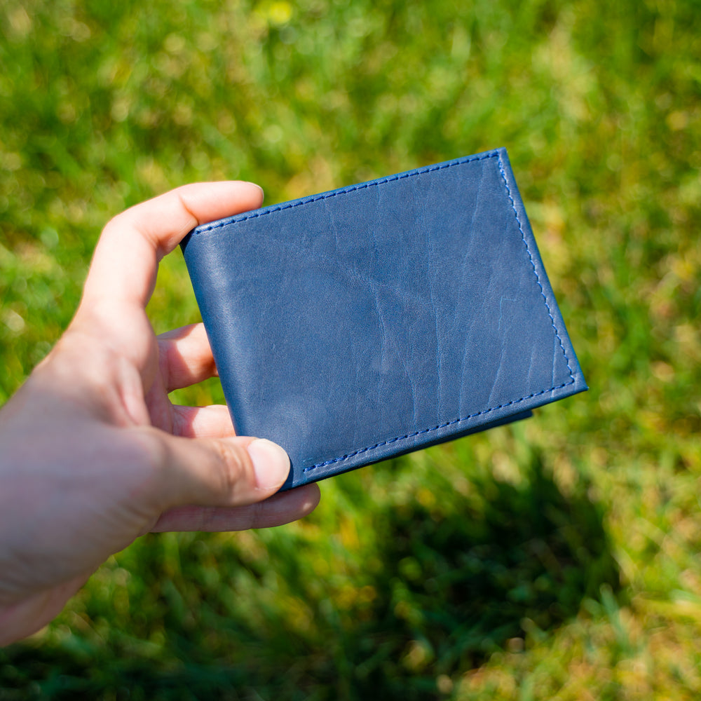 
                      
                        Handcrafted Navy Leather Bifold Wallet 
                      
                    