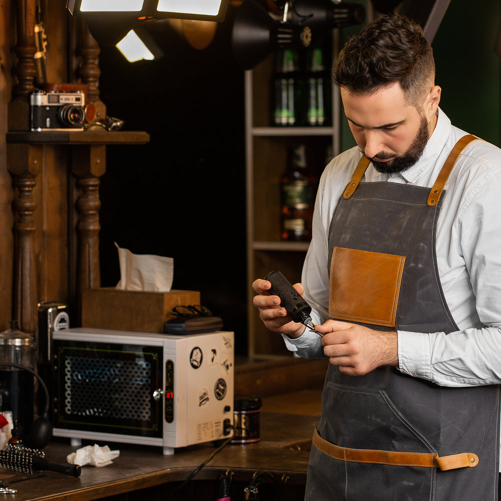 
                      
                        Waxed Canvas and Leather Apron - Grey
                      
                    