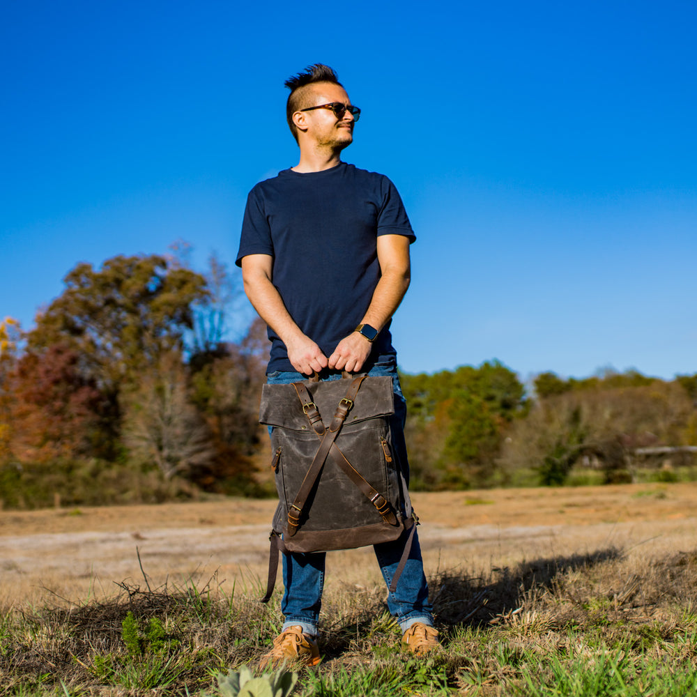 
                      
                        Canvas and Leather Cross Straps Backpack - Charcoal backpack - olpr.
                      
                    