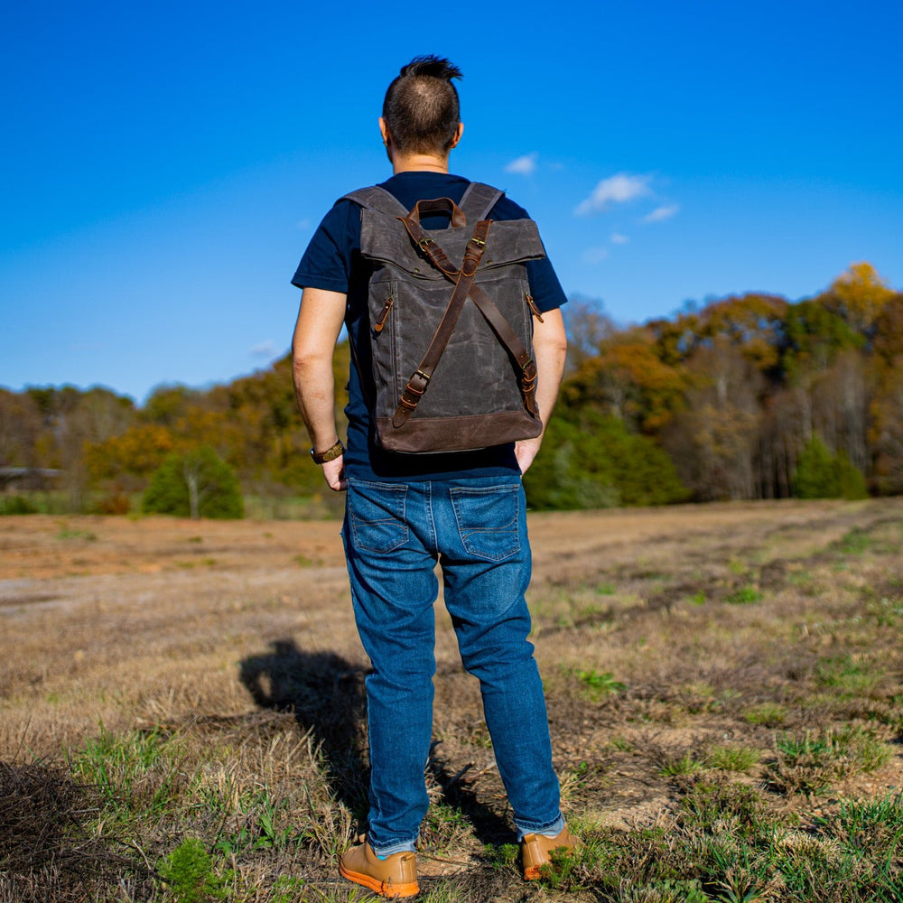 
                      
                        Canvas and Leather Cross Straps Backpack - Charcoal backpack - olpr.
                      
                    