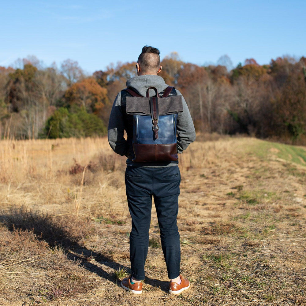 
                      
                        Rolltop Backpack Navy/Chestnut Backpack - olpr.
                      
                    